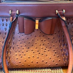 Ostrich handbag Louis Vuitton Brown in Ostrich - 26833888